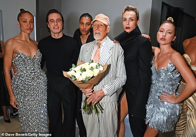 (L to R) Adwoa Aboah, Marco Capaldo, Kai-Isaiah Jamal, Antony Price, Edie Campbell and Lila Moss pose backstage at the 16Arlington x Antony Price Salon Show on November 17, 2025 in London
