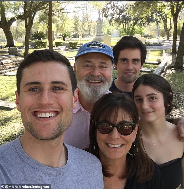 Michele and Rob Reiner smile in a snap with their children Jake, Romy and Nick (behind)