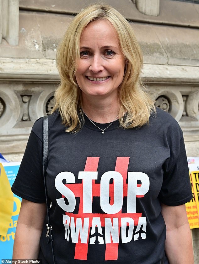 Pictured: Ms Moseley outside the Royal Courts of Justice at a demonstration against the Government's Rwanda scheme in September 2022