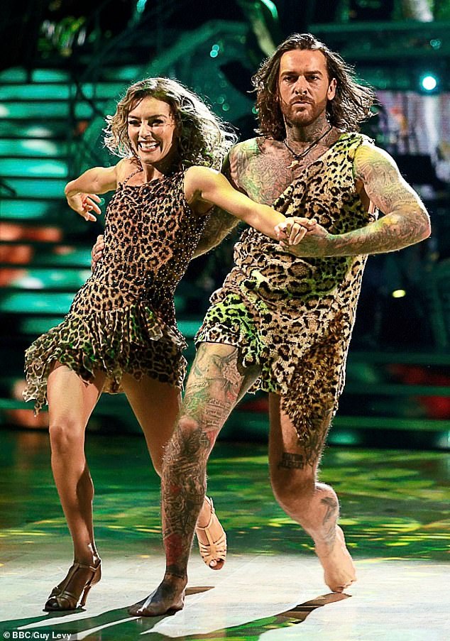 Pete,37, dances with his partner Jowita Przystal in a leopard print costume on Strictly Come Dancing last year