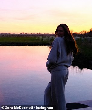 Zara beamed for a solo snap with the same picturesque backdrop