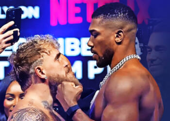 Anthony Joshua makes slitting throat gesture to Jake Paul after almost coming to blows in face off ahead of Netflix bout