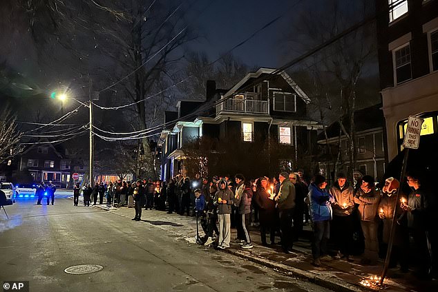 Loureiro's neighbors remembered him as a kind-hearted, 'wonderful man', while students flocked to the candle-lit vigil in his memory, as shown in the photograph above