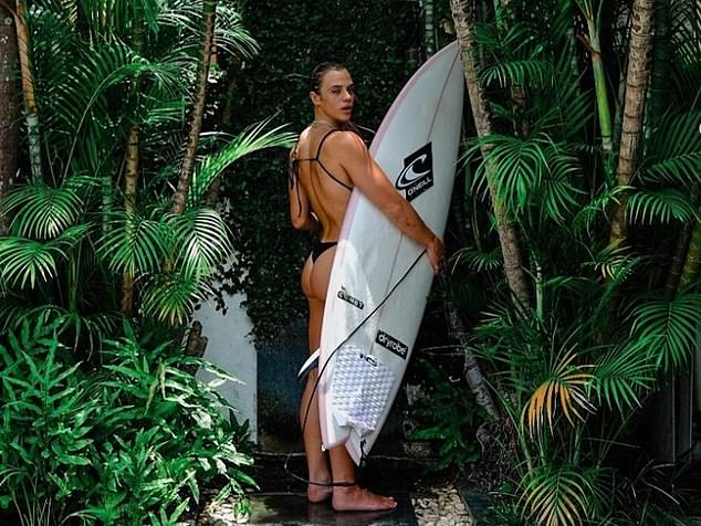 Laura Crane, 30, was competing at the Nazaré Big Wave Challenge in Portugal on Saturday when she took on the monstrous wall of water