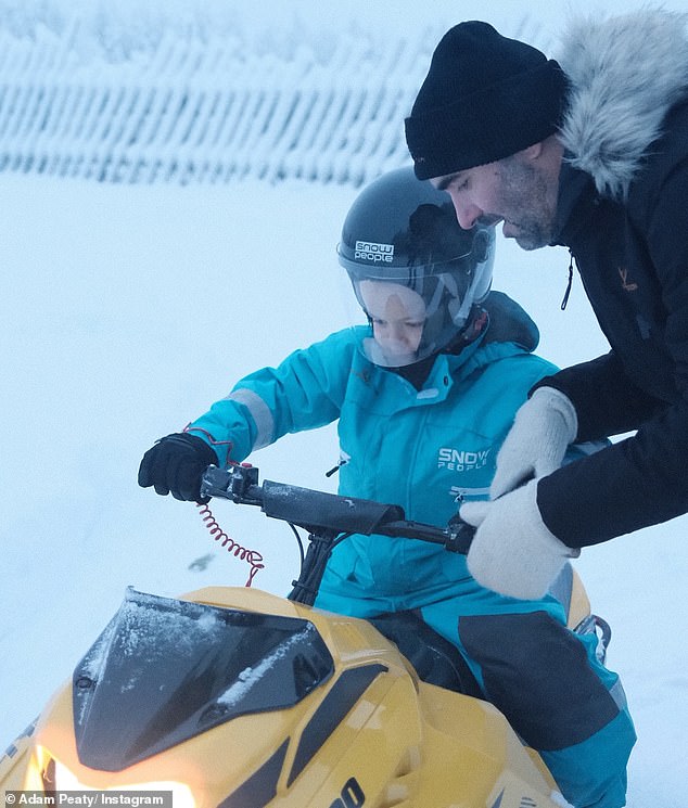 Elsewhere, George was seen being given a brief tutorial after climbing aboard a miniature snowmobile