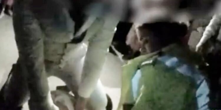 Moment drunk usher who BIT wedding guest’s finger off at reception is tackled to floor in front of horrified partygoers