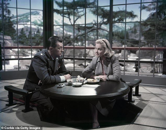 The Swedish actress's early English language films included 1957 Korean War epic The Hunters, in which she starred alongside Robert Mitchem (pictured)