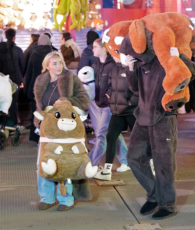 The pair were spotted enjoying the attractions, with the duo managing to scoop two big prizes as they carried huge stuffed animals around the park