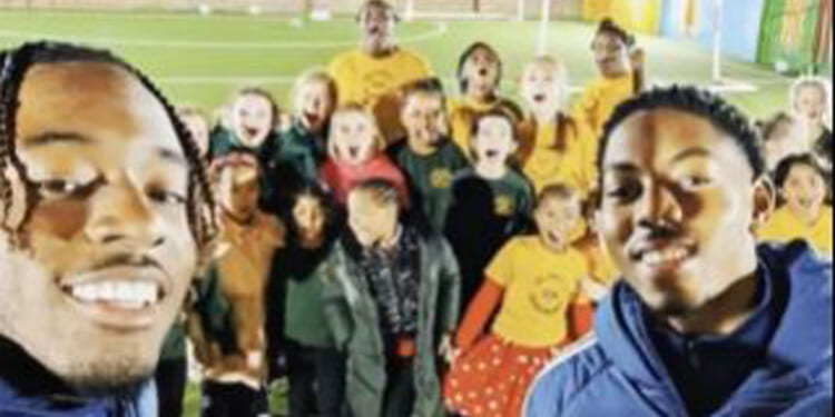 Watch adorable moment Arsenal stars Myles Lewis-Skelly and Noni Madueke leave school kids in shock with surprise visit