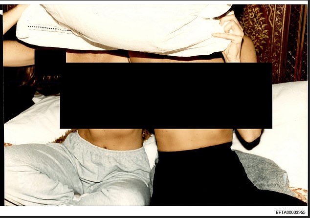 A photo of two woman without shirts was released in the files