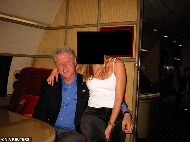 Former president Clinton post with an unknown woman