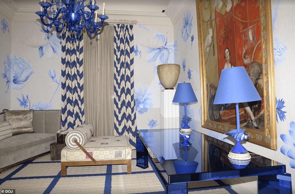 The trove of images were released Friday in the largest dump of evidence taken from Epstein's estate - including a camera seen in the top right of Epstein's bedroom