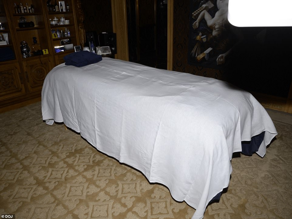 One room in his home appeared to have a massage table in the center of it