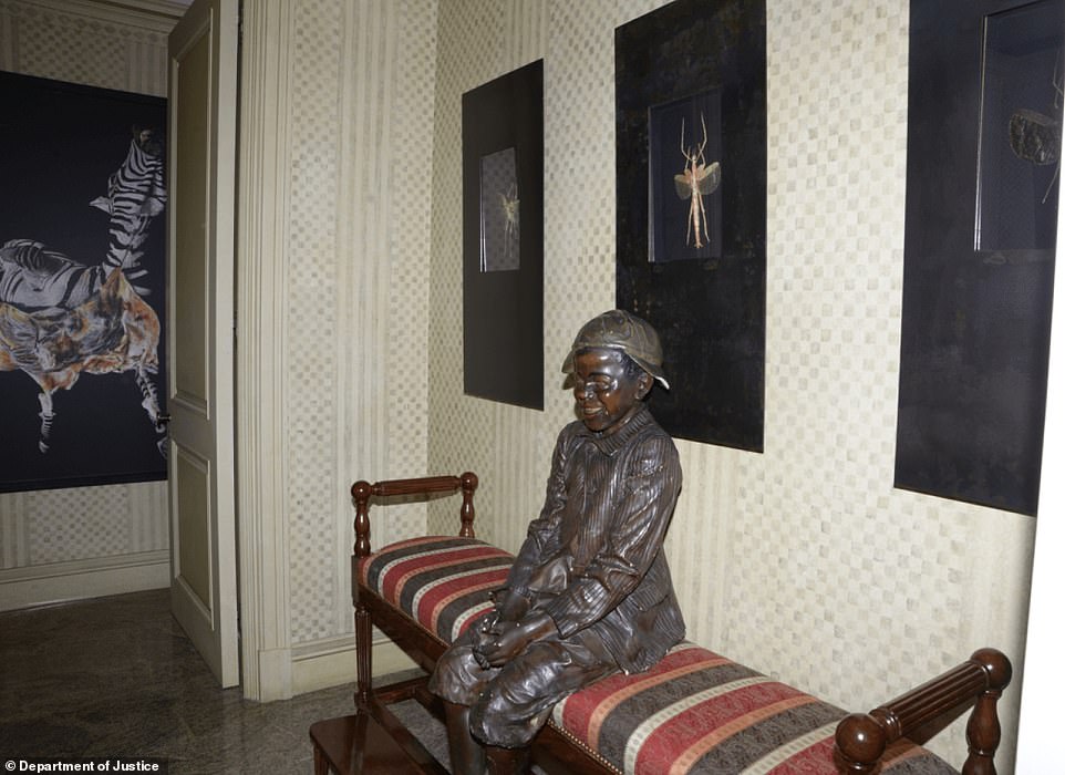 Epstein's home had a statue of a young boy below images on insects