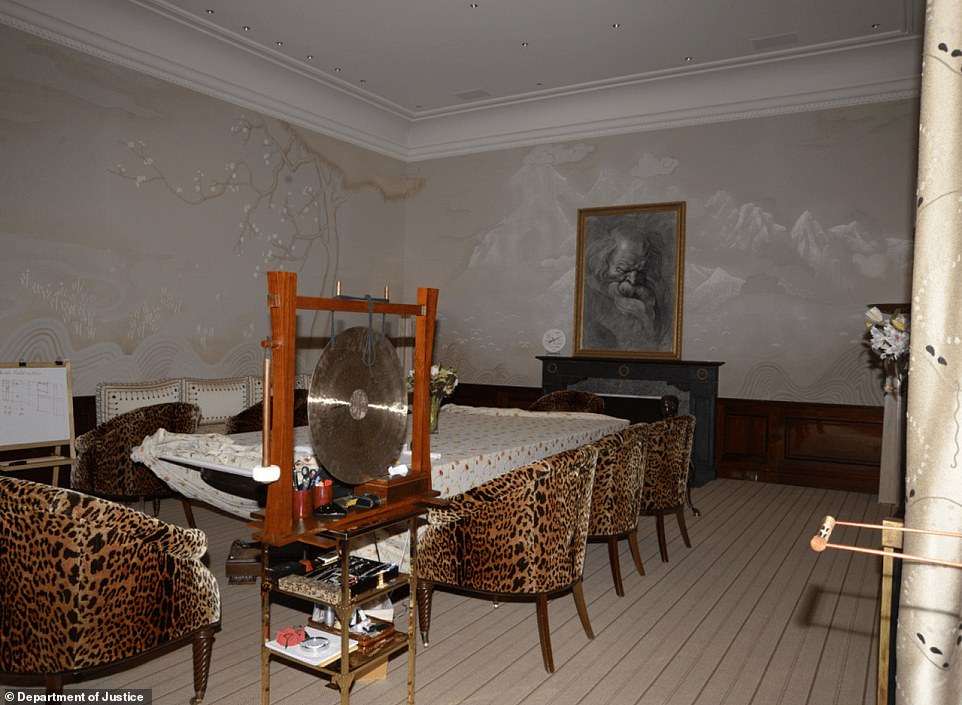A dining room featured a gong and multiple leopard-print chairs