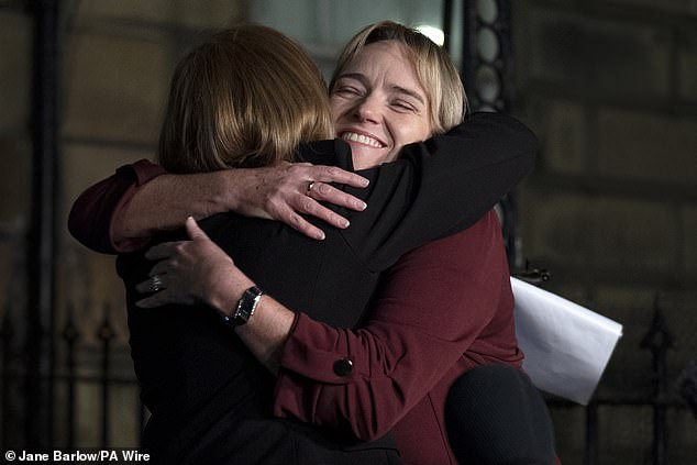 Sandie hugs her solicitor Margaret Gribbon outside the Edinburgh Tribunals Service after she won a claim for harassment in her employment tribunal case against a health board