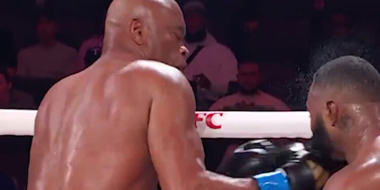 Watch Anderson Silva's brutal KO of Tyron Woodley in slow-motion as UFC legend, 50, uses trademark Anthony Joshua move