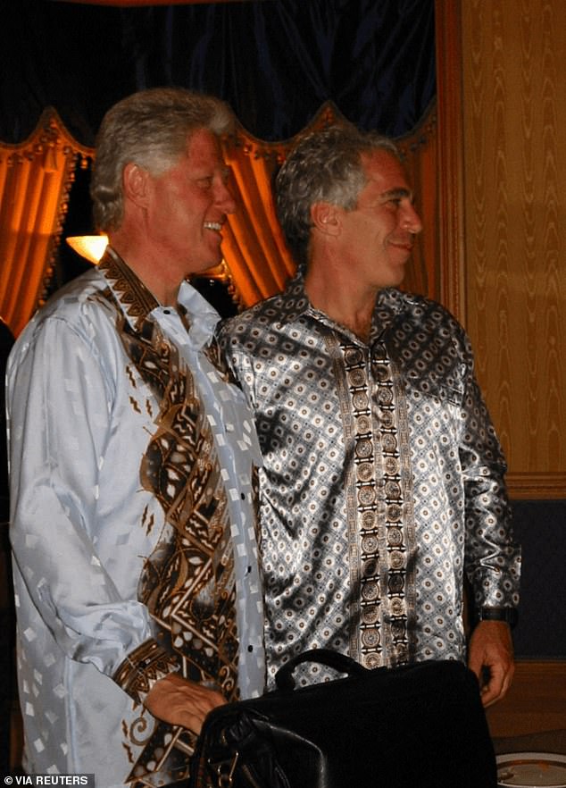 In one picture, Clinton and Epstein posed together wearing silk shirts