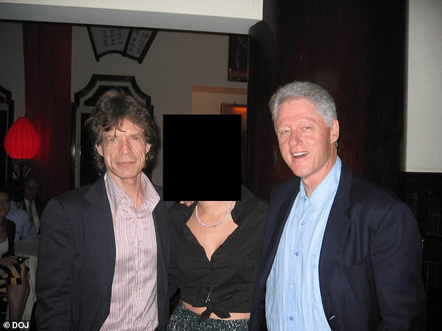 Mick Jagger made an appearance in the files, and posed with Clinton and an unidentified woman