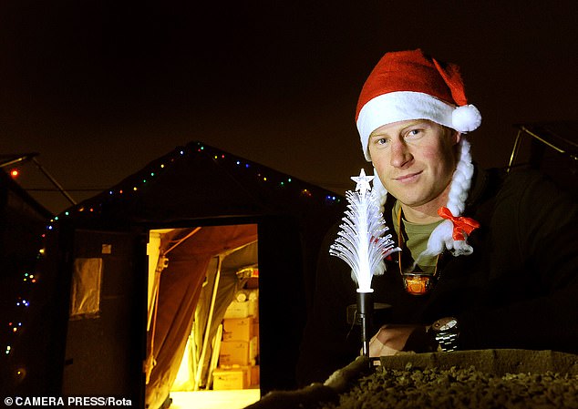Royal author Robert Lacey revealed in his book Battle of Brothers how in Afghanistan, Harry happily 'put on a Santa hat to cook breakfast for his crew' and 'queued for his turkey dinner alongside thousands of other servicemen and women'