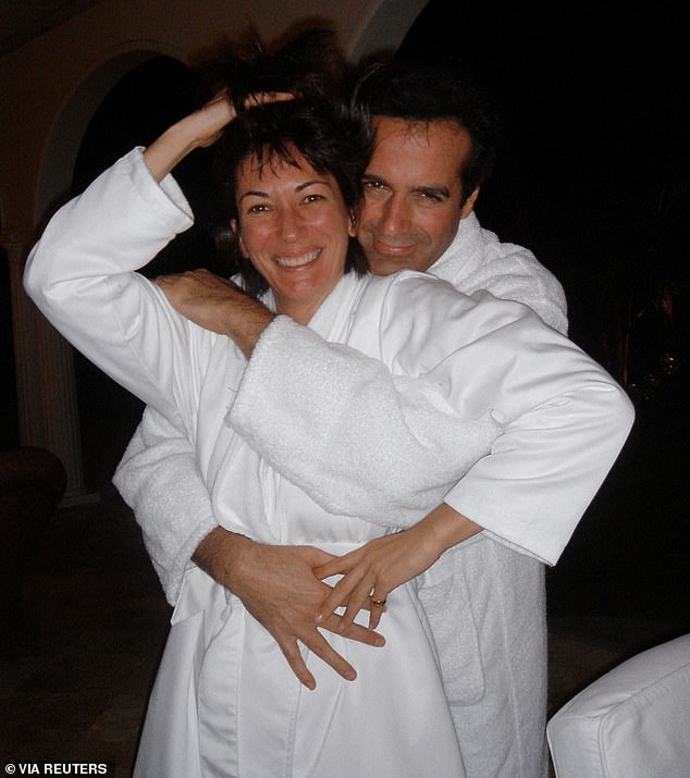In another image, Maxwell poses in front of Copperfield with the pair entwining their arms around one another while wearing towelling robes