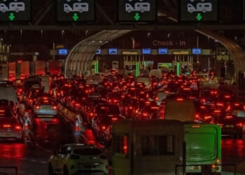 Christmas getaway chaos as hundreds of families held in huge queues after IT issue causes mass delays