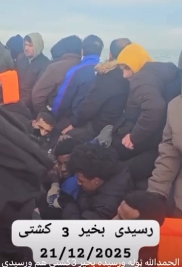 Exclusive footage obtained by the Daily Mail shows the 'complete chaos' of a dinghy making its way to Britain this morning