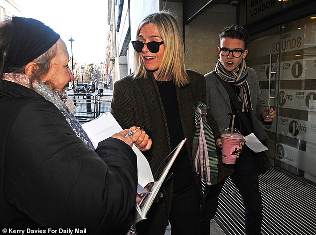 She was also seen signing autographs for fans as she made her way into the building to record the show