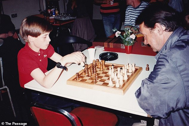 Prince William was photographed playing chess during one visit during his childhood