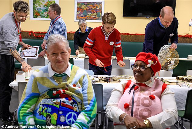 The father and son were seen setting up long tables for service users at The Passage