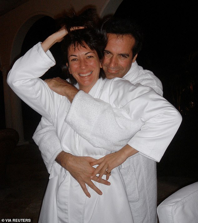 In another image, Maxwell poses in front of Copperfield with the pair entwining their arms around one another while wearing towelling robes