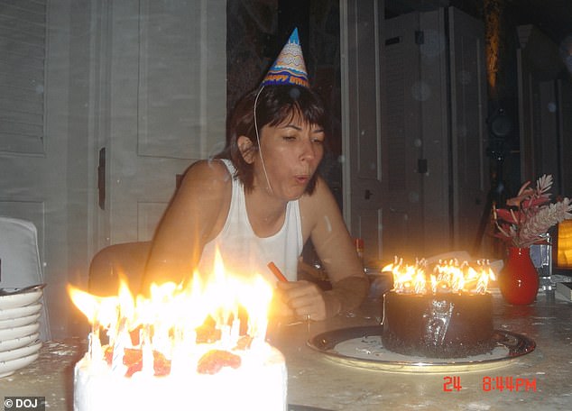 Maxwell is seen celebrating her birthday, as she poses to blow out candles on a cake