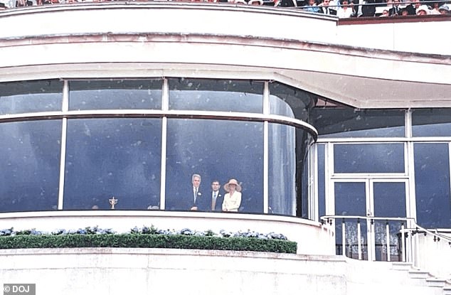 A photograph of Prince Andrew flanked by Jeffrey Epstein and Ghislaine Maxwell looking down onto the racecourse from Ascot's Royal Box in June 2000