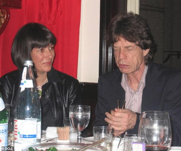 The convicted sex trafficker dines next to Rolling Stones frontman Mick Jagger
