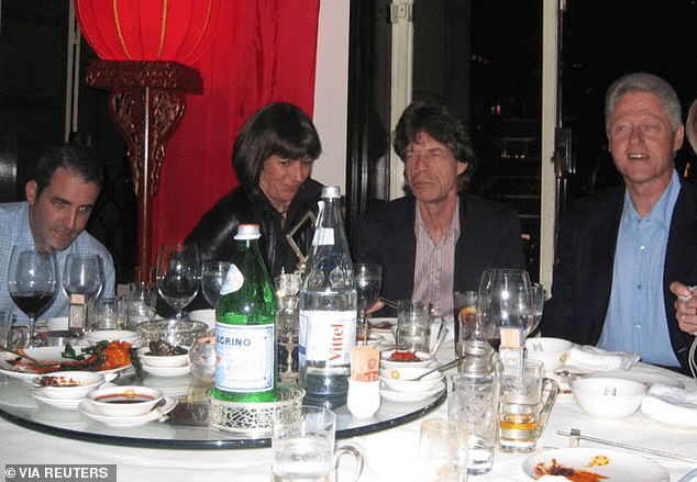 Former US President Bill Clinton was also in attendance, sitting next to Jagger on his right