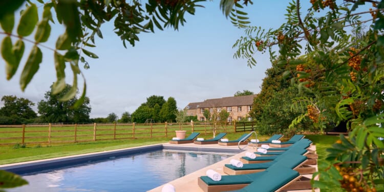 The countryside spa hotel with outdoor hot tubs overlooking Highland cows 
