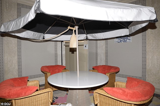 Pictured: A room in Epstein's home that had an outdoor furniture set