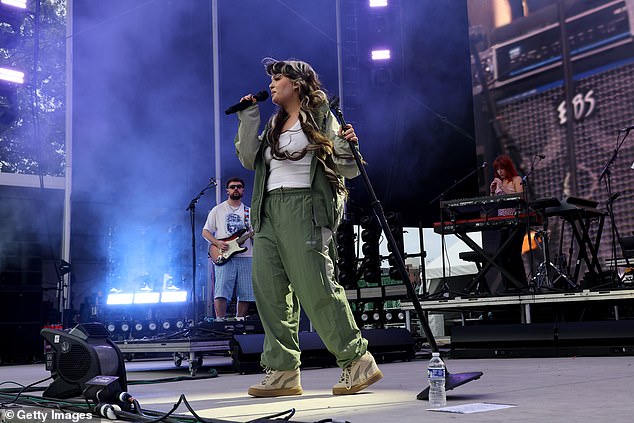 During the accident the English star was 'carried off stage' by staff during her performance at a festival in New York, but eventually reassured fans that she was fine (pictured on stage that day performing at All Things Go NYC)