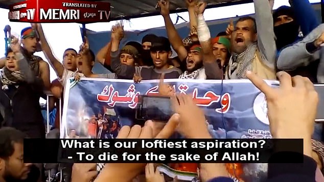 Wadee, seen wearing a Palestinian flag headband, chants his desire is to 'die for Allah'