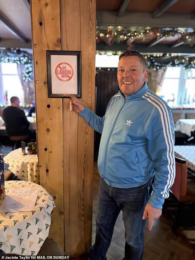 Pub Landlord Martin Knowles with NO LABOUR MPS sign at Marsh Inn Pudsey in Rachel Reeves constituency on Saturday