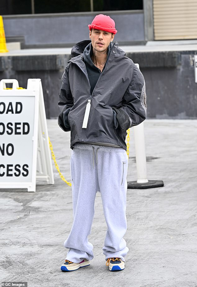 Justin broke his silence on the speculation about his marriage with his album Swag, laying bare their relationship struggles in emotional lyrics about 'testing patience' and 'taking a break' ¿ while also confessing he 'will not' leave her; pictured on April 15 in Los Angeles