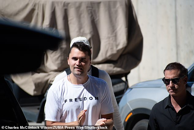 Charlie Kirk arrives at Utah Valley University, greeted by supporters and security personnel