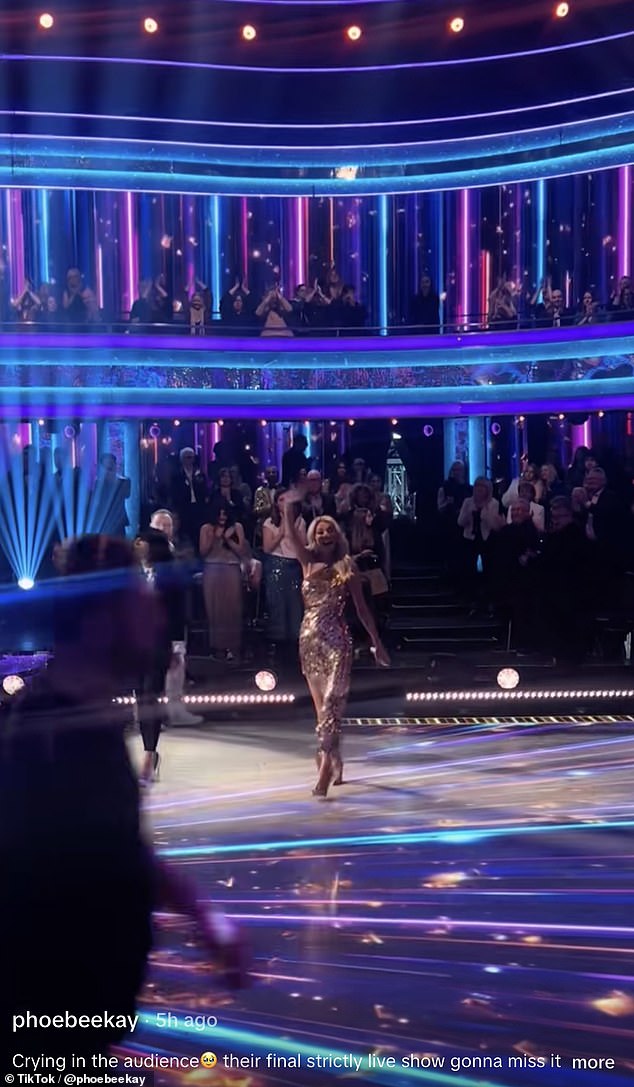 As the pair stepped forward, Tess could be seen scanning the audience before spotting her daughter, her face breaking into a wide smile as she waved back