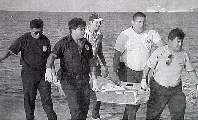 Kirsty's body is carried from the sea to the beach after the tragic accdent that killed her