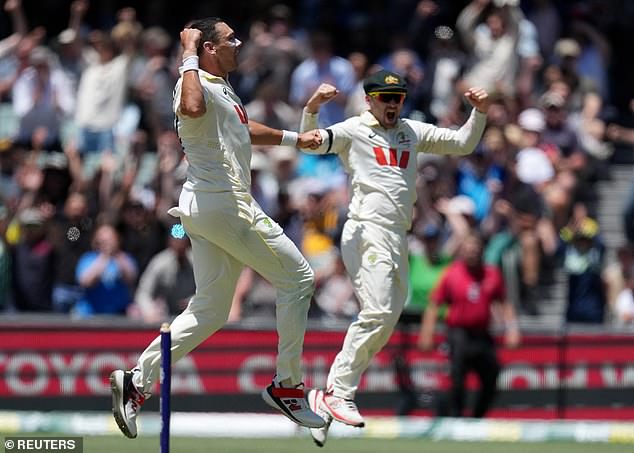 Scott Boland (left) roars with teammate Josh Inglis after taking Tongue's wicket to stave off a fine fightback from the Three Lions