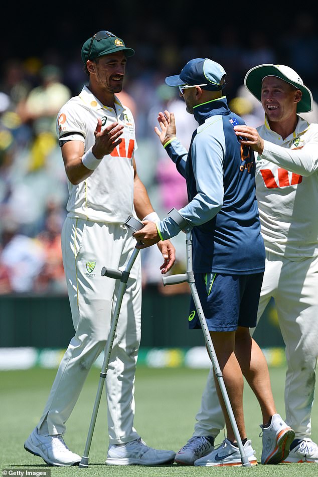 Nathan Lyon is pictured after returning to Adelaide Oval on crutches. He is in extreme doubt to return for the Boxing Day Test after a hamstring injury in the first session left him unable to take any further part in the match