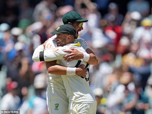 Mitchell Starc (left) and Jake Weatherald celebrate the victory, which saw the hosts seal the series win in just 11 days of play