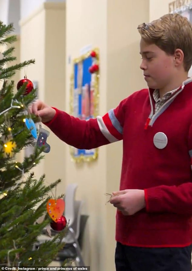 The young prince helped to decorate a tree which had been donated to the charity from Westminster Abbey following his mother's carol service