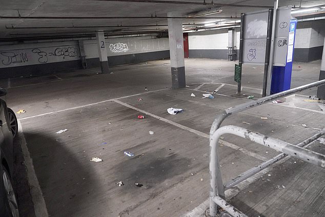 Pictured: The shopping centre's multi-storey car park where rubbish is scattered everywhere