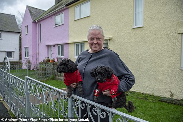 Karen Johnson, who lives on the street, praised beautiful design of the homes, adding how 'peaceful' it is